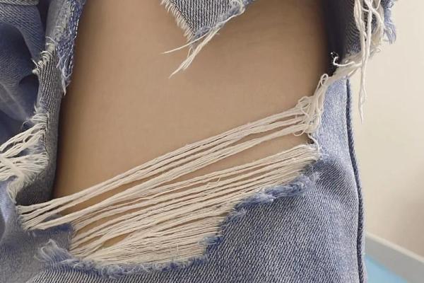 梦见新买的衣服破了是什么意思